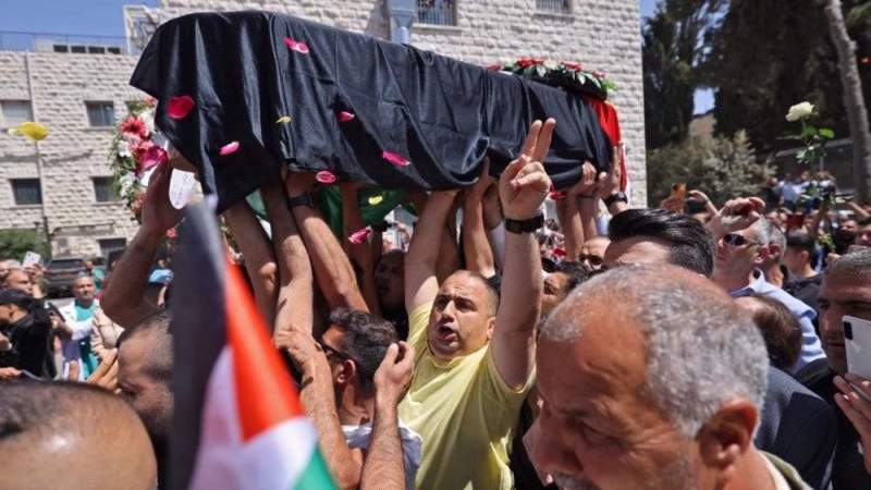  Israeli Forces Attack, Beat Palestinian Mourners in Journalist’s Funeral 