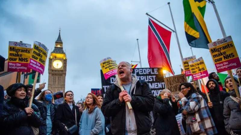 Hundreds rally in London in protest against British government's controversial migration bill