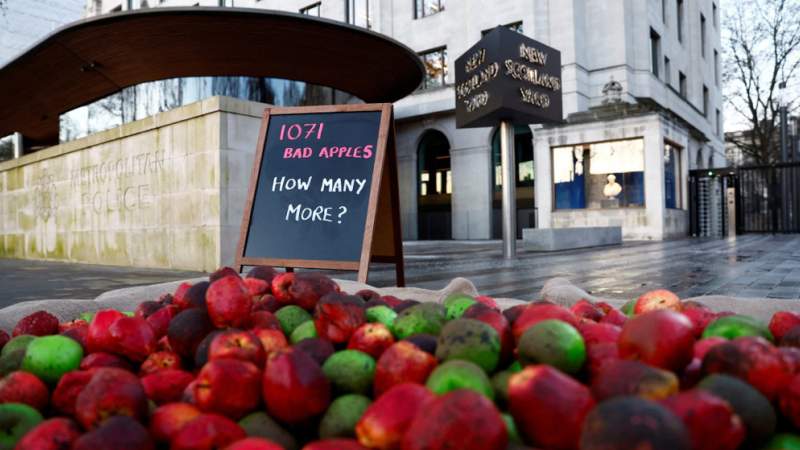 Protesters Dump Rotten Apples Outside Scotland Yard after Police Rape Confessions