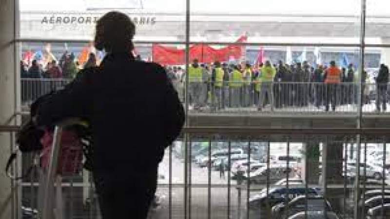  French Airport Workers Protest Over Pay Conditions 